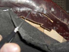 Cutting a small piece of leather